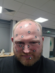 Figure 25: Subject with Scanner Markers placed upon him (photograph taken by Michael Alcock)