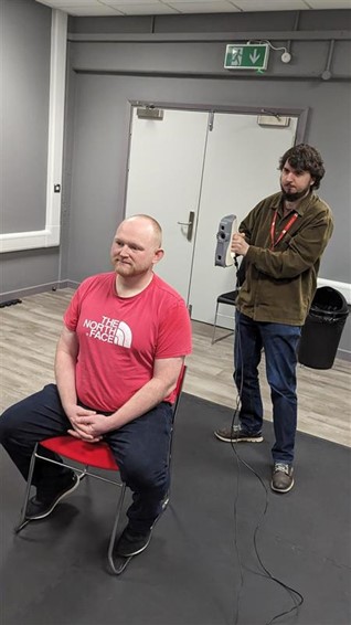 Figure 29: Subject being scanned Artec Scanner from back (photograph taken by Mark Warren)