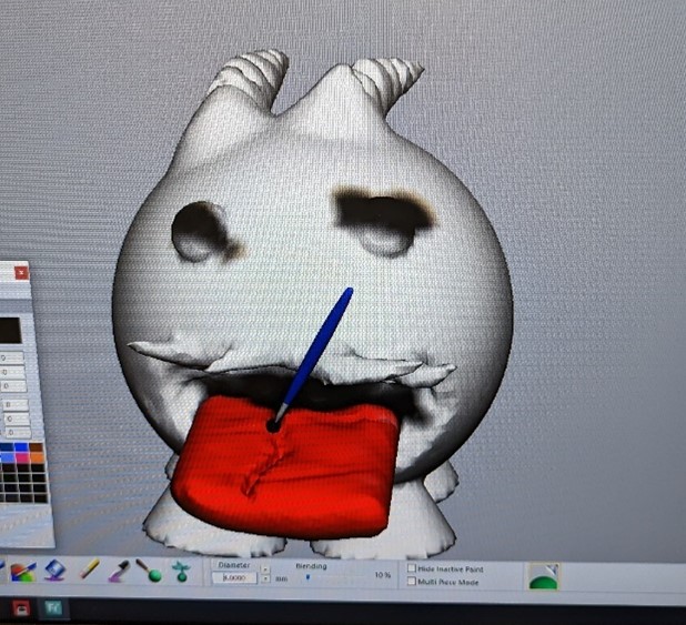 Figure 35 Painting Poro mesh tongue (photo taken by Mark Warren)