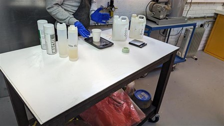 Figure 38 Subject is demonstrating Polyurethane Resin mixing (photograph taken by Mark Warren)