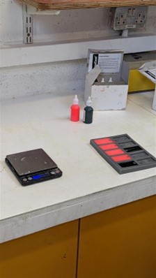 Figure 39 Resin dyed and placed in mould (seen right) (photograph taken by Mark Warren)