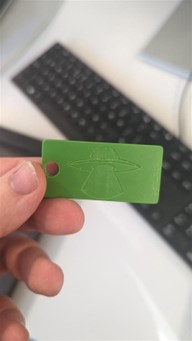 Figure 41 Finished keyring dob of resin dryed in mould (Alien dob, photograph taken by Mark Warren)