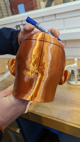 Figure 38 Portion mark up to find center of head for hinges (photograph taken by Mark Warren)