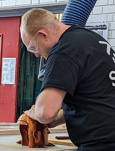 Figure 40 Subject is sanding his own head (photograph by Mark Warren)